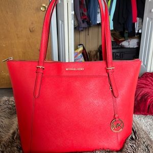 Michael Kor’s hand bag